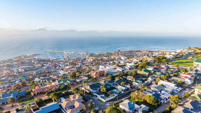 Aerial view over Mossel Bay and the Indian Ocean at sunrise from Linkside